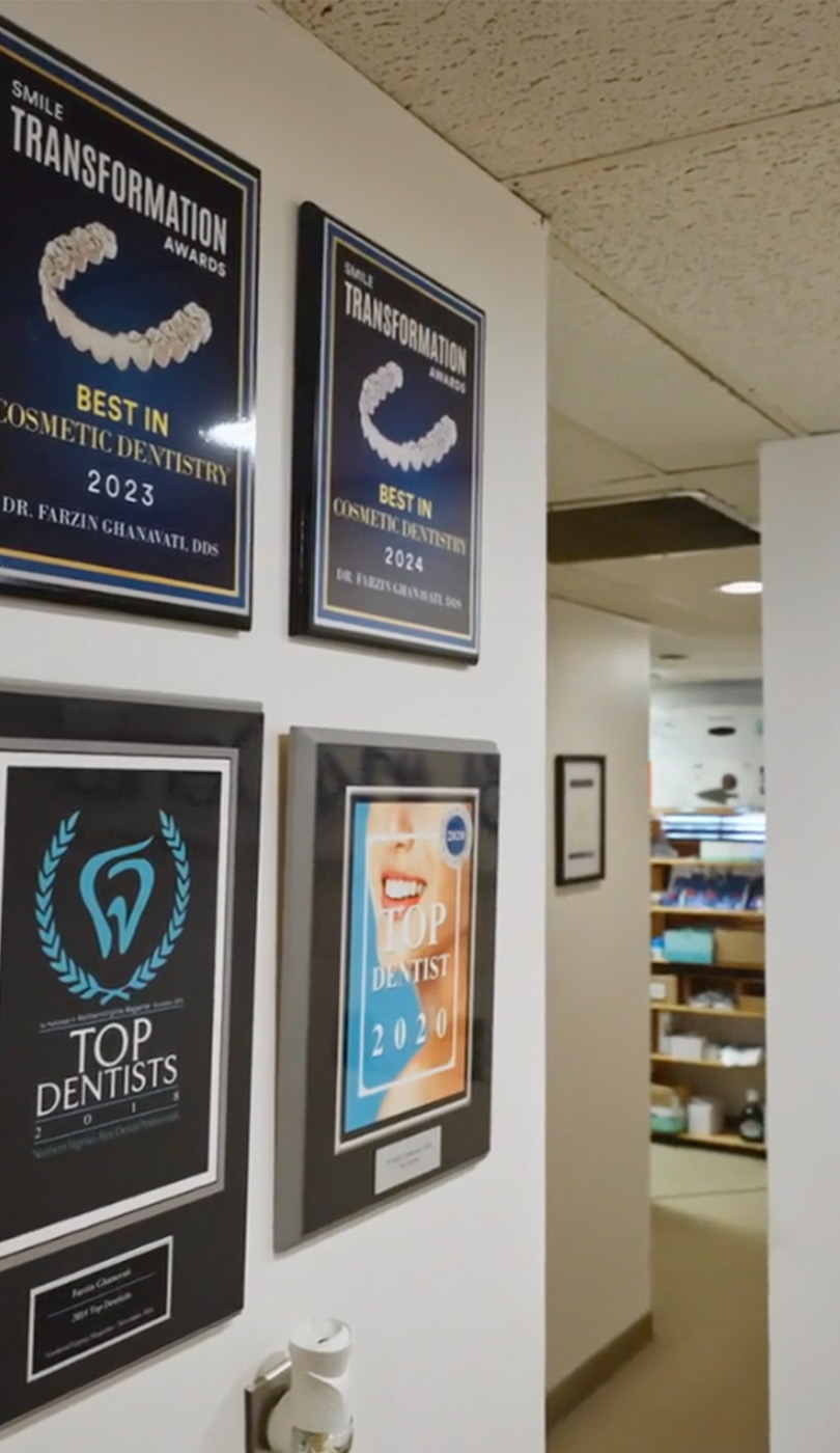 The image shows a modern dental or medical office interior with a dental chair, equipment, and a clean, professional environment.